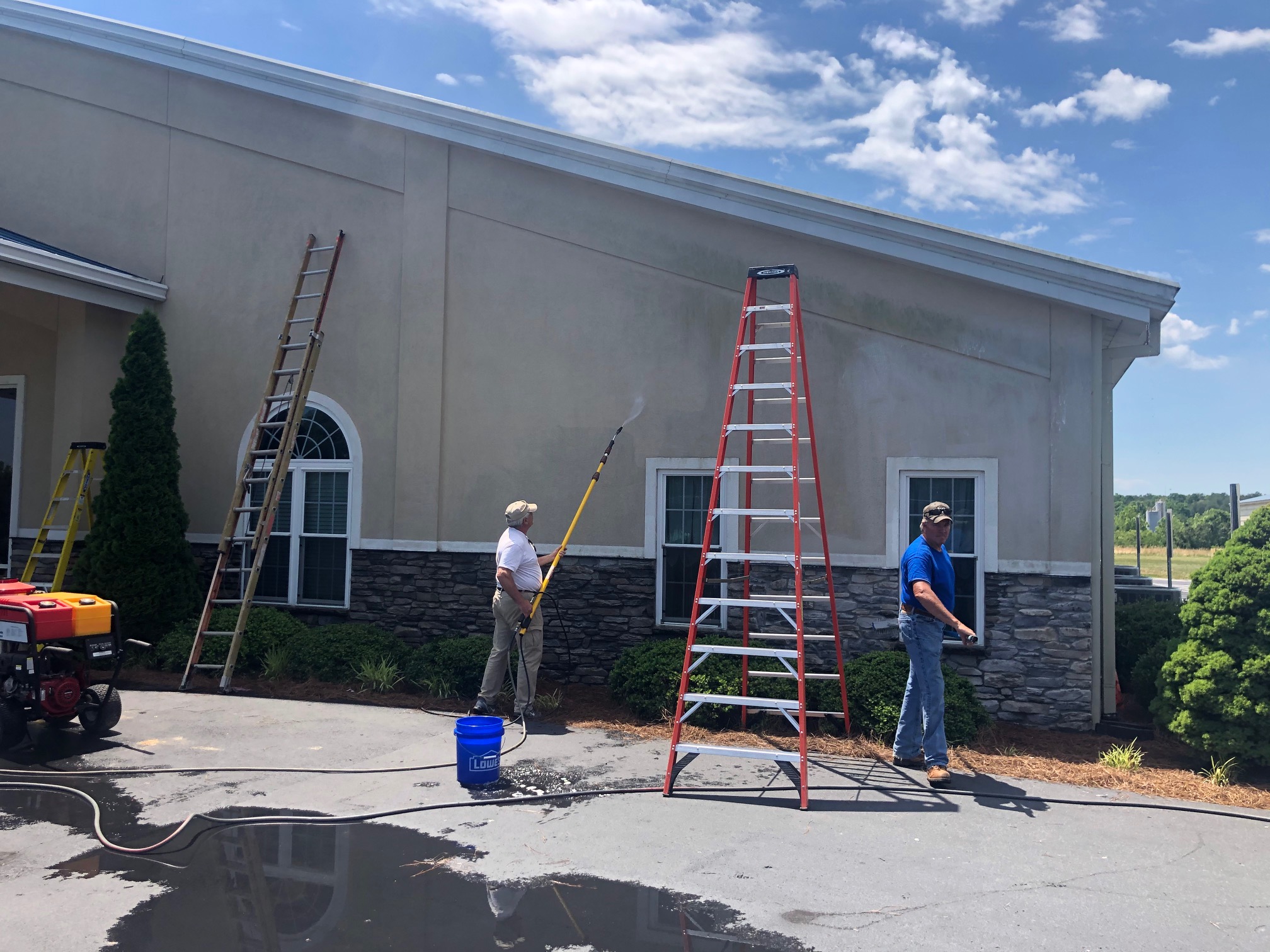 men cleaning outside 2